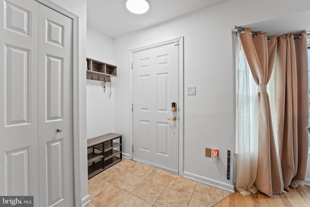 3436 Caledonia Cir, Woodbridge, VA 22192 - mudroom featuring light tile patterned floors and baseboards