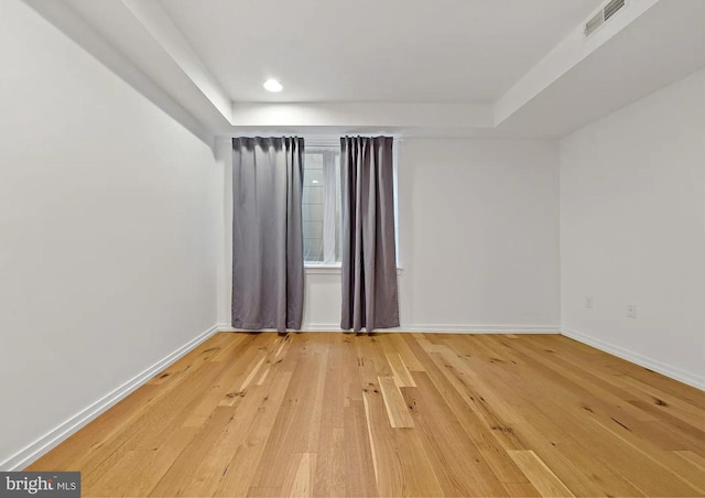 2538 W Girard Ave Unit A, Philadelphia, PA 19130 - empty room with a raised ceiling, light wood finished floors, and recessed lighting