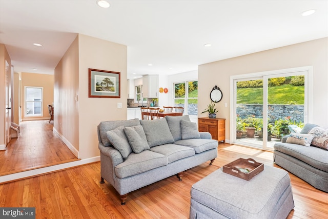 9505 Columbia Blvd, Silver Spring, MD 20910 - living area with light wood finished floors and recessed lighting