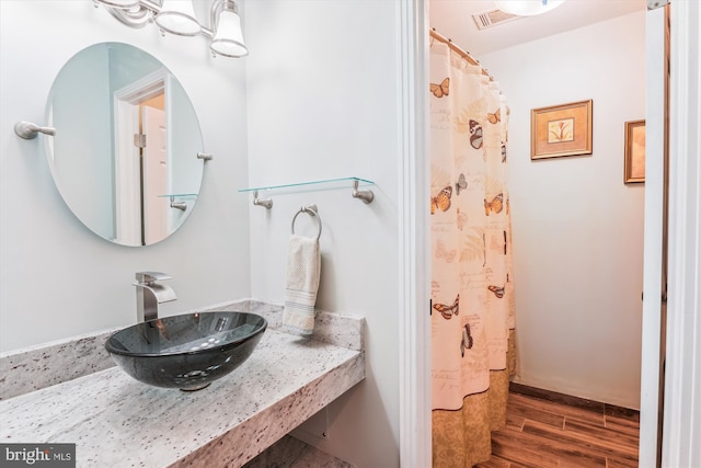 9505 Columbia Blvd, Silver Spring, MD 20910 - bathroom featuring wood finished floors and vanity