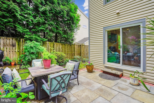 9505 Columbia Blvd, Silver Spring, MD 20910 - fenced backyard with a patio area and outdoor dining area