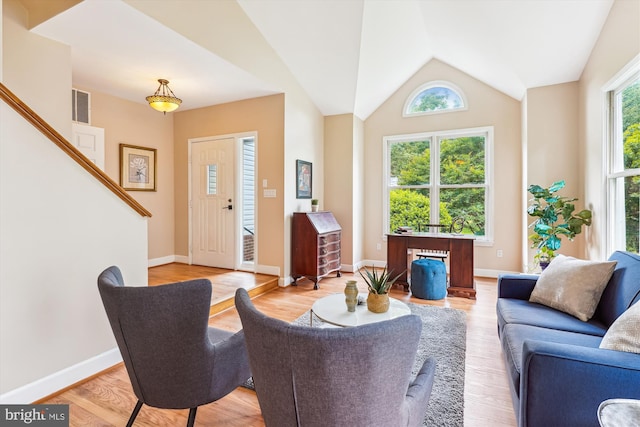 9505 Columbia Blvd, Silver Spring, MD 20910 - living room featuring light wood-style flooring and vaulted ceiling