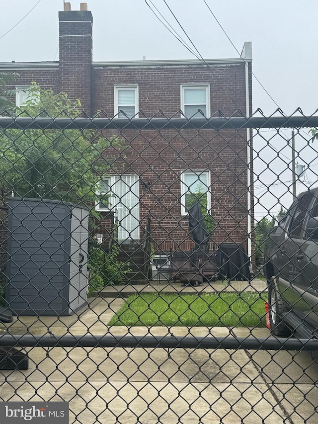 540 Lebaum St SE, Washington, DC 20032 - view of side of home with a chimney and brick siding
