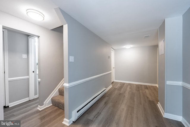 1537 Havilland Pl, Frederick, MD 21702 - corridor with a baseboard radiator, wood finished floors, and stairway