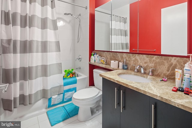 1425 Locust St Unit 5C, Philadelphia, PA 19102 - bathroom featuring vanity, shower / bath combo with shower curtain, decorative backsplash, and tile patterned flooring