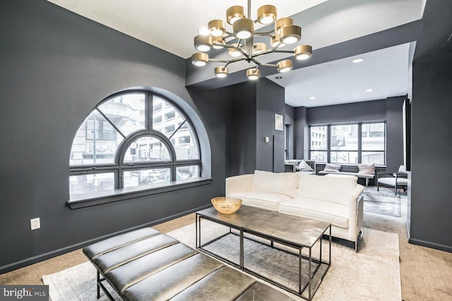 1425 Locust St Unit 5C, Philadelphia, PA 19102 - living area featuring light carpet and a chandelier