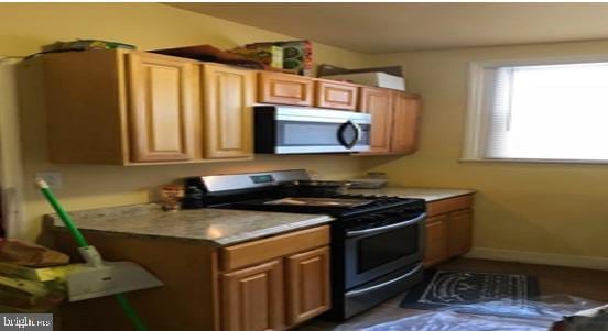 3231 Fontain St, Philadelphia, PA 19121 - kitchen with stainless steel appliances and light countertops