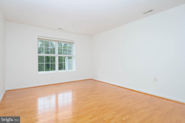 12030 Tralee Rd Unit 306, Lutherville Timonium, MD 21093 - unfurnished room with wood finished floors and baseboards