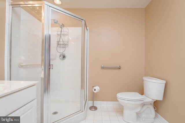 12030 Tralee Rd Unit 306, Lutherville Timonium, MD 21093 - full bath with tile patterned floors, vanity, and a shower stall