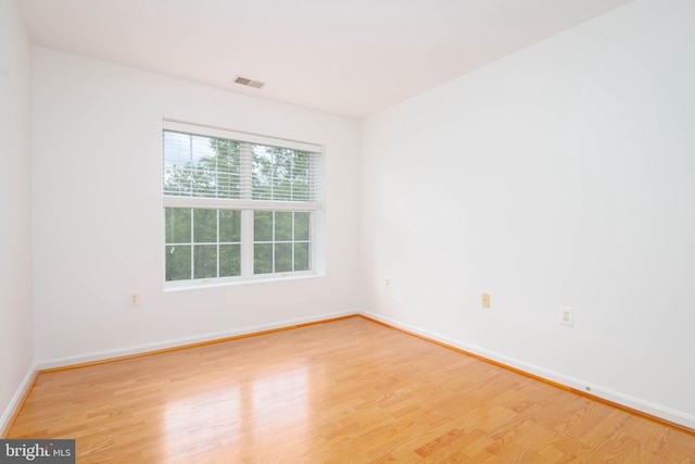 12030 Tralee Rd Unit 306, Lutherville Timonium, MD 21093 - unfurnished room with light wood-style floors and baseboards