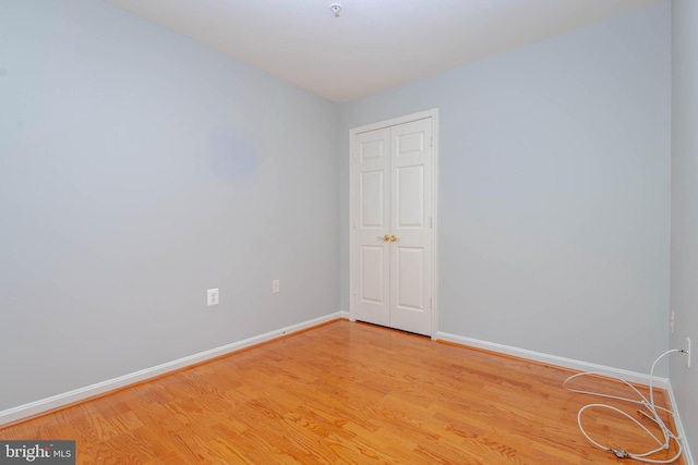 12030 Tralee Rd Unit 306, Lutherville Timonium, MD 21093 - spare room with light wood-style floors and fire sprinkler in ceiling