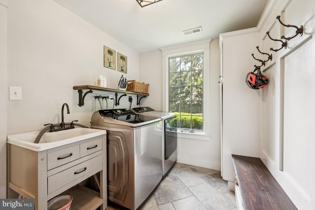 236 Carriage Hill Dr, Moorestown, NJ 08057 - laundry room featuring washing machine and dryer and light tile patterned floors