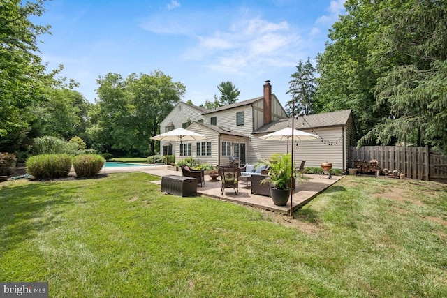 236 Carriage Hill Dr, Moorestown, NJ 08057 - rear view of house with a patio area, a chimney, and an outdoor living space