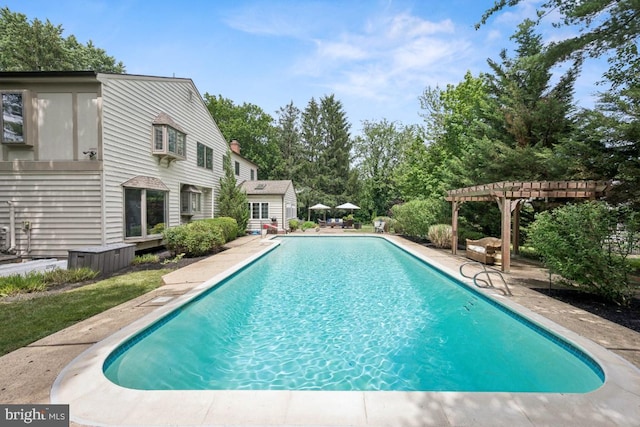 236 Carriage Hill Dr, Moorestown, NJ 08057 - view of swimming pool featuring a pergola, a patio, and view of wooded area