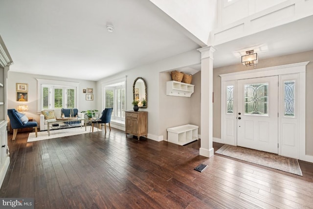 236 Carriage Hill Dr, Moorestown, NJ 08057 - foyer with ornate columns and dark wood-style floors