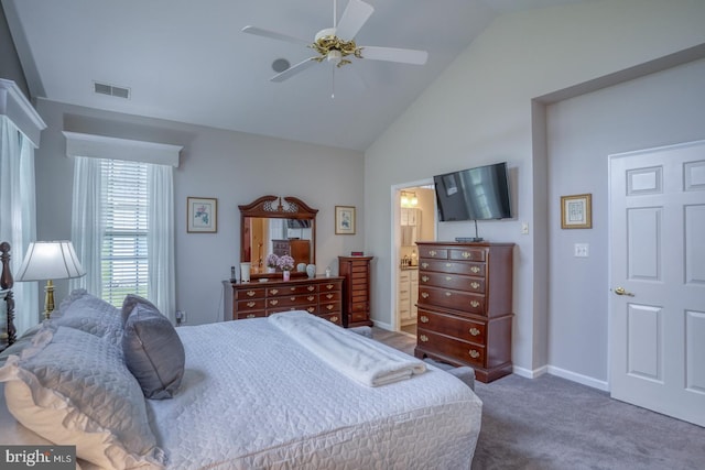 577 Whispering Trl, Middletown, DE 19709 - bedroom with vaulted ceiling, carpet flooring, a ceiling fan, and ensuite bath