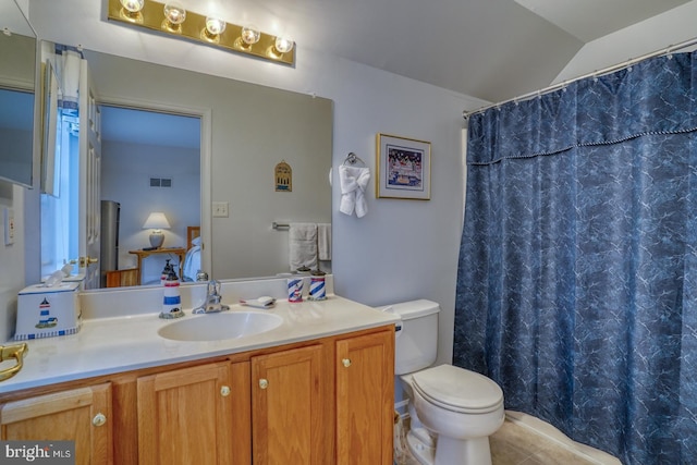 577 Whispering Trl, Middletown, DE 19709 - full bathroom featuring vanity, vaulted ceiling, tile patterned floors, and curtained shower
