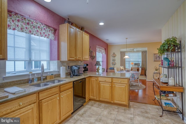 577 Whispering Trl, Middletown, DE 19709 - kitchen with dishwasher, a peninsula, decorative light fixtures, light stone counters, and recessed lighting