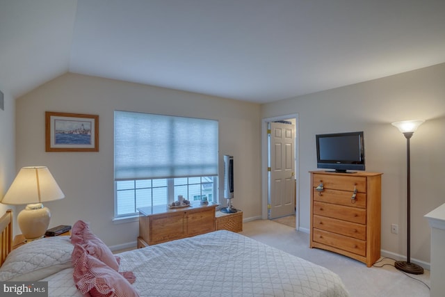 577 Whispering Trl, Middletown, DE 19709 - bedroom with light carpet and lofted ceiling