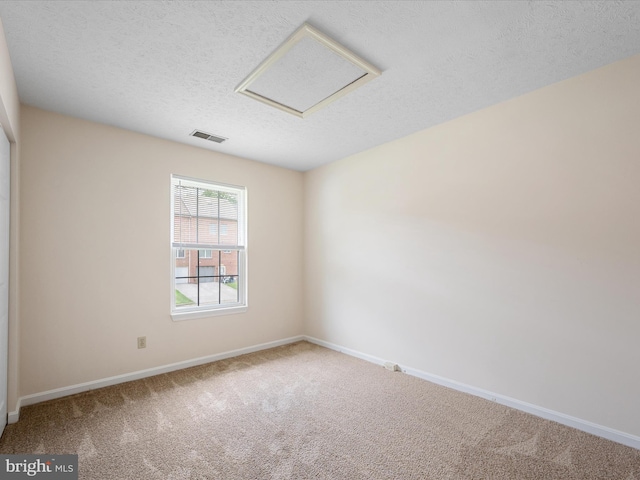2635 Limestone Ct, Winchester, VA 22601 - carpeted spare room with attic access and a textured ceiling