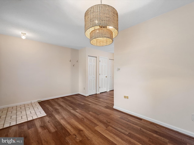 2635 Limestone Ct, Winchester, VA 22601 - spare room with a chandelier and wood finished floors