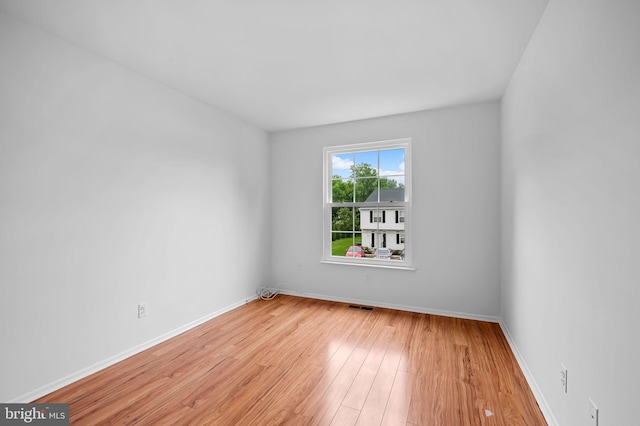 2 Brookshire Dr Unit A, Reisterstown, MD 21136 - spare room featuring light wood finished floors and baseboards