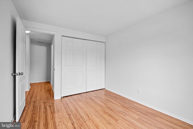 2 Brookshire Dr Unit A, Reisterstown, MD 21136 - unfurnished bedroom with light wood-type flooring and a closet