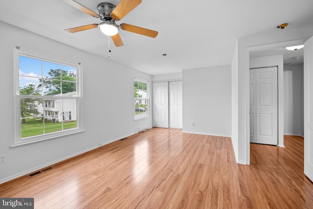 2 Brookshire Dr Unit A, Reisterstown, MD 21136 - unfurnished bedroom with light wood finished floors and ceiling fan