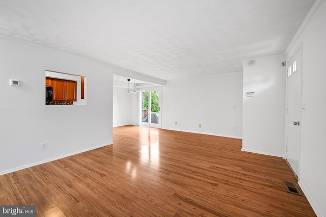 2 Brookshire Dr Unit A, Reisterstown, MD 21136 - unfurnished room with wood finished floors and crown molding