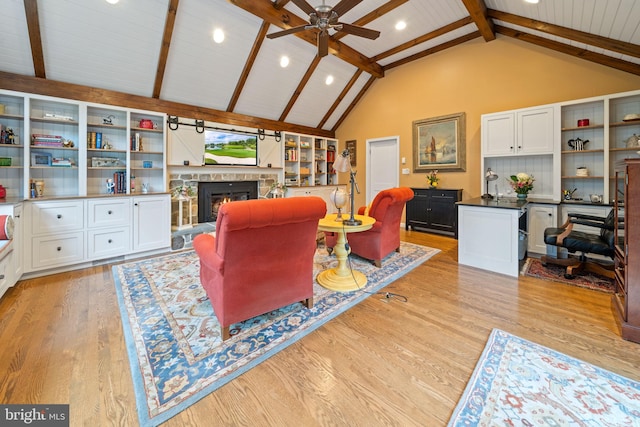 4105 Meadow Ln, Newtown Square, PA 19073 - living area featuring ceiling fan, recessed lighting, a stone fireplace, light wood finished floors, and beam ceiling