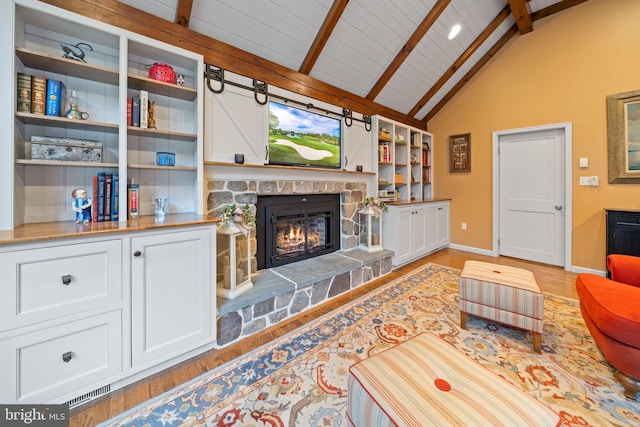 4105 Meadow Ln, Newtown Square, PA 19073 - living room with a fireplace, light wood-style floors, high vaulted ceiling, and a wood ceiling with exposed beams