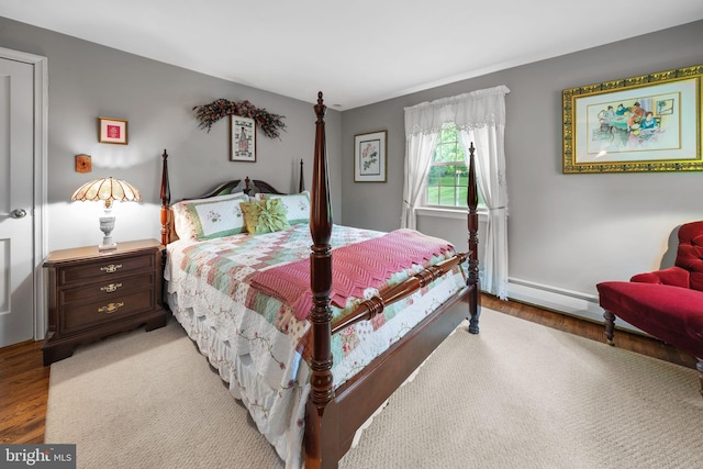 4105 Meadow Ln, Newtown Square, PA 19073 - bedroom with light wood-style flooring and a baseboard radiator