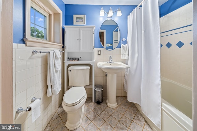 4105 Meadow Ln, Newtown Square, PA 19073 - full bathroom with tile walls, tile patterned floors, shower / bathtub combination with curtain, and a wainscoted wall
