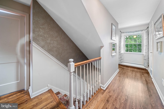4105 Meadow Ln, Newtown Square, PA 19073 - stairs with a baseboard heating unit and wood finished floors