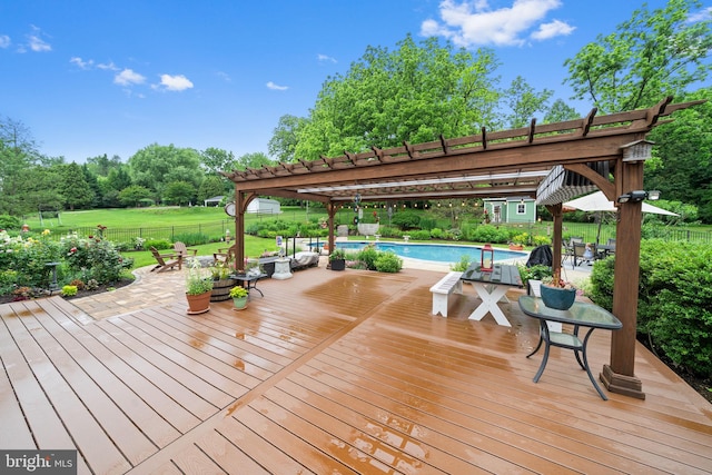4105 Meadow Ln, Newtown Square, PA 19073 - deck with a pergola, view of wooded area, outdoor dining space, and a patio