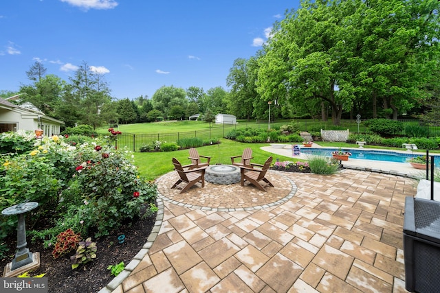 4105 Meadow Ln, Newtown Square, PA 19073 - fenced backyard featuring an outdoor fire pit, a patio area, and view of scattered trees