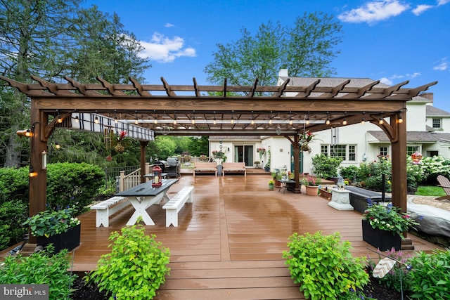 4105 Meadow Ln, Newtown Square, PA 19073 - wooden deck with outdoor dining space and a pergola