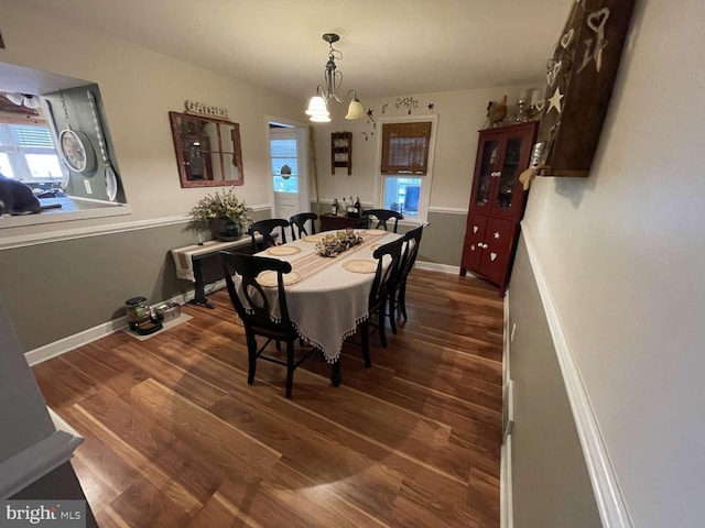 914 New Hope St, Norristown, PA 19401 - dining area featuring dark wood-style flooring and a chandelier