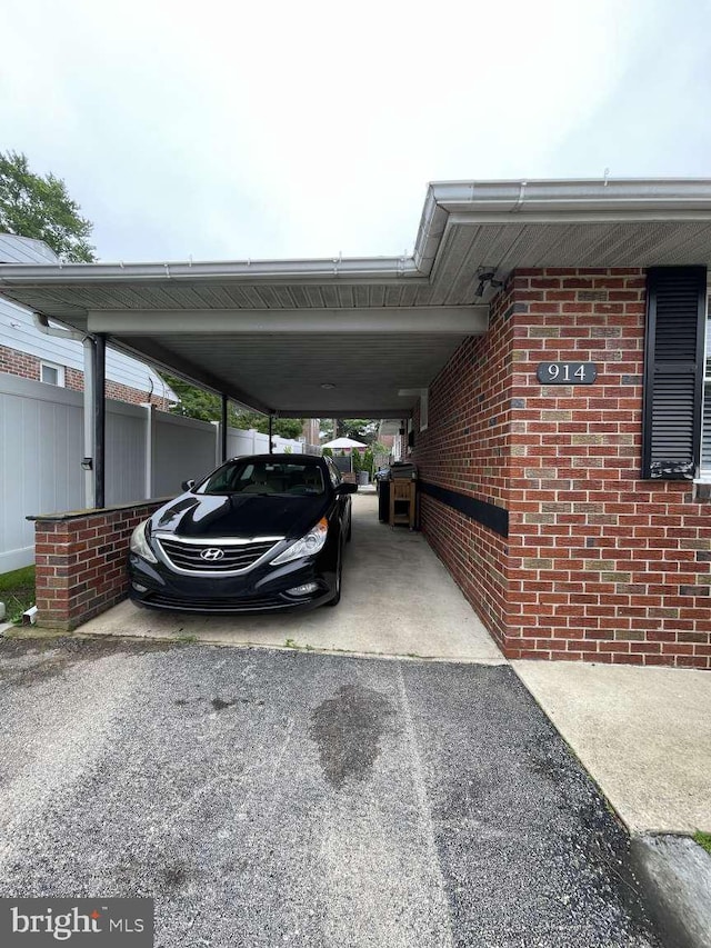 914 New Hope St, Norristown, PA 19401 - view of car parking featuring driveway and a carport