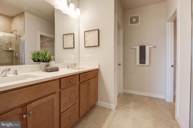 43792 Middleway Ter, Ashburn, VA 20147 - bathroom with double vanity, a shower stall, and tile patterned floors