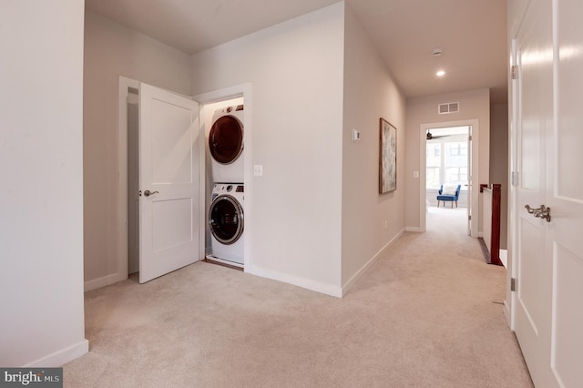43792 Middleway Ter, Ashburn, VA 20147 - washroom with stacked washer and clothes dryer, light colored carpet, and recessed lighting