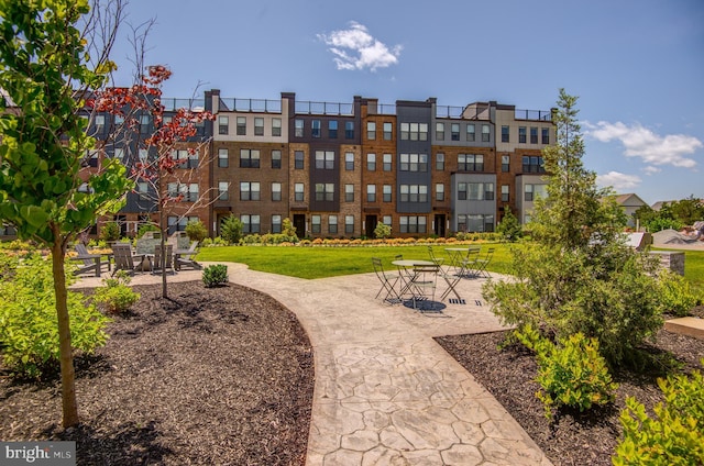 43792 Middleway Ter, Ashburn, VA 20147 - view of community with a yard and a patio area