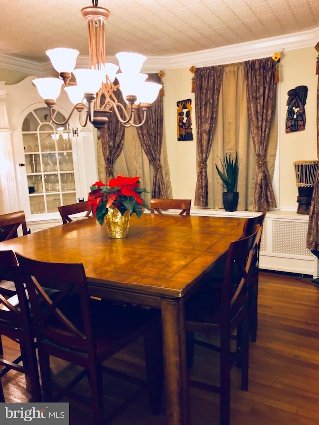 3107 Evergreen Ave, Baltimore, MD 21214 - dining space with a chandelier, wood finished floors, and ornamental molding