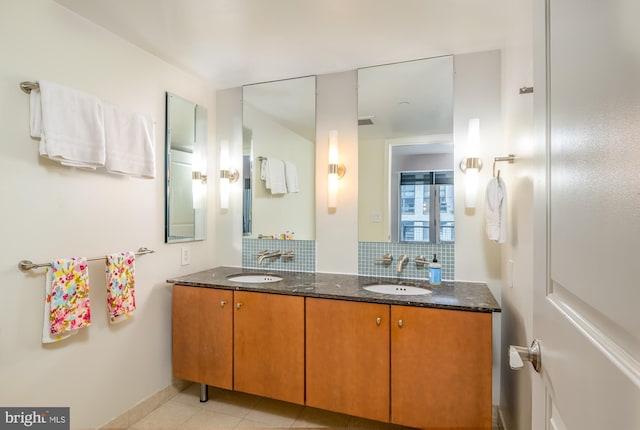 1025 1st St SE Unit 713, Washington, DC 20003 - full bath featuring tasteful backsplash, double vanity, and tile patterned flooring