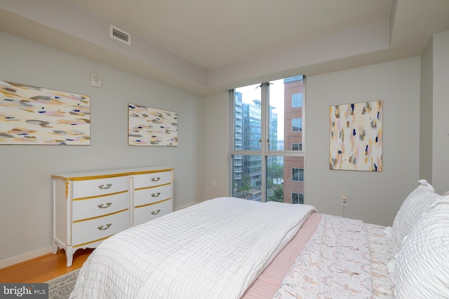 1025 1st St SE Unit 713, Washington, DC 20003 - bedroom featuring wood finished floors and baseboards