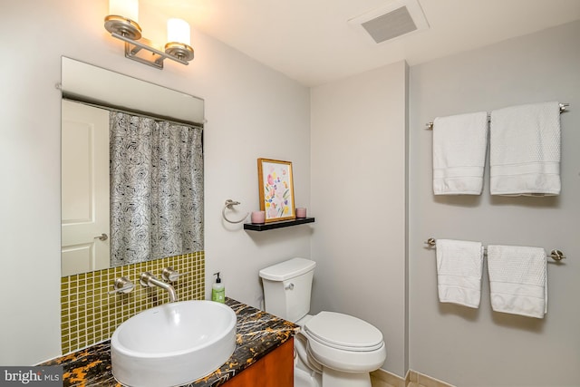 1025 1st St SE Unit 713, Washington, DC 20003 - bathroom featuring vanity and decorative backsplash