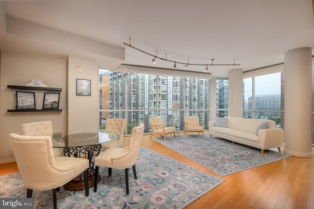 1025 1st St SE Unit 713, Washington, DC 20003 - dining room featuring wood finished floors and track lighting
