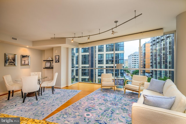 1025 1st St SE Unit 713, Washington, DC 20003 - dining area with a city view, wood finished floors, and track lighting