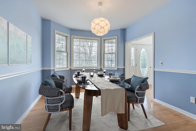 14 Doolin Ln, Rehoboth Beach, DE 19971 - dining room with wood finished floors and healthy amount of natural light