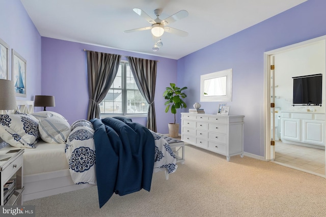 14 Doolin Ln, Rehoboth Beach, DE 19971 - bedroom with light colored carpet, ensuite bathroom, and ceiling fan